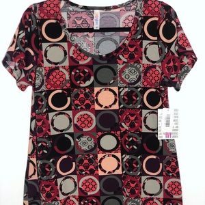 LuLaRoe Classic Tee NWT Medium 
2nd pic Size Chart